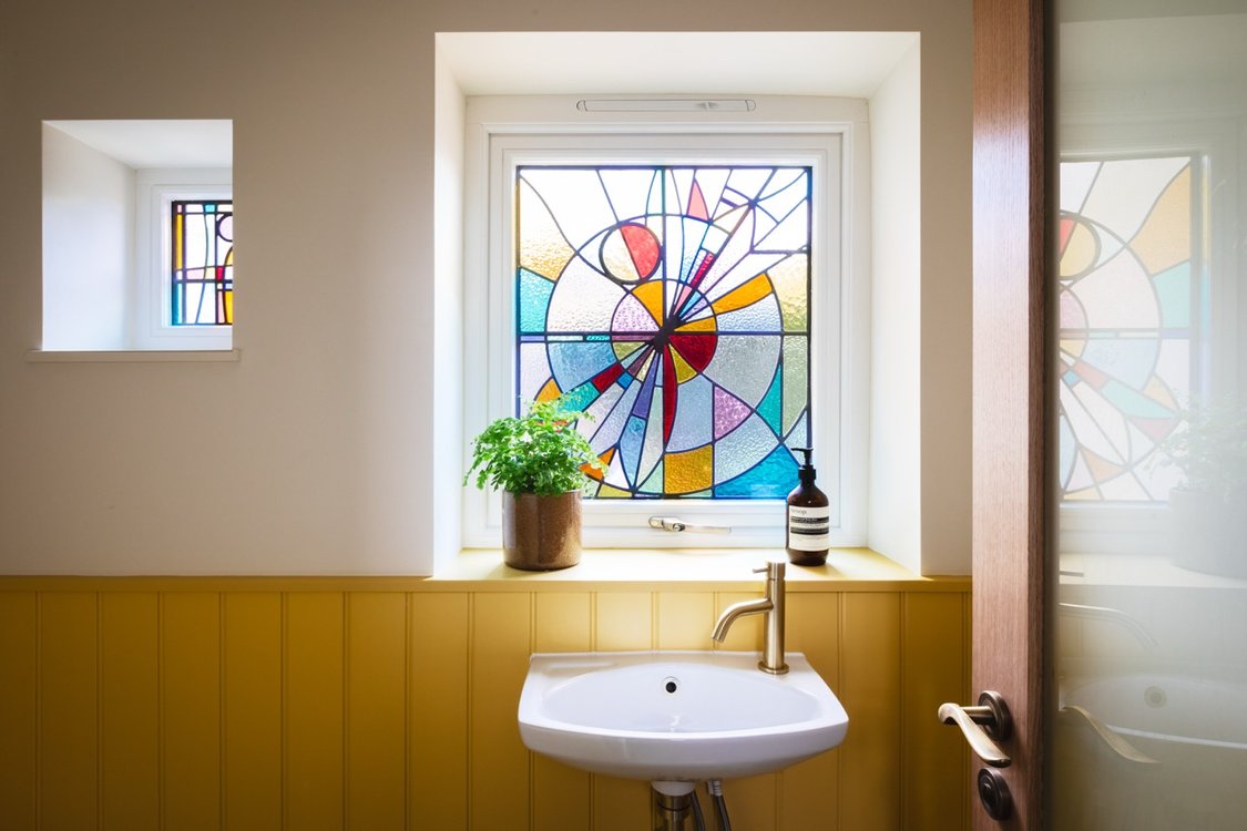 Bathroom with stainedglass